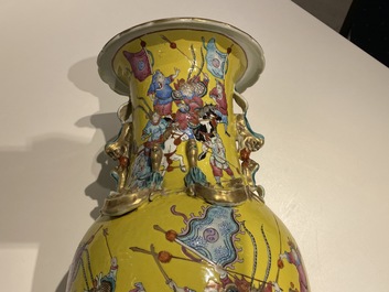 A Chinese yellow-ground famille rose 'warrior' vase, 19th C.